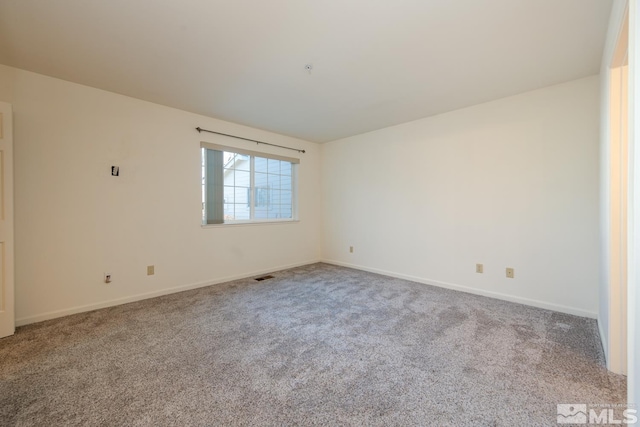 view of carpeted spare room