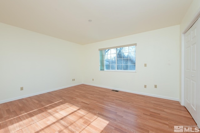 unfurnished bedroom with light hardwood / wood-style floors