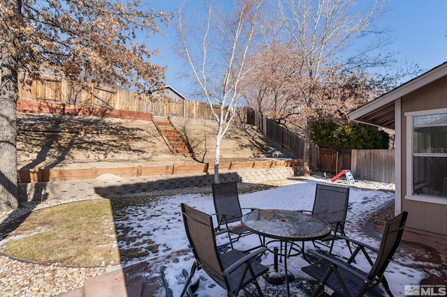 view of snow covered patio