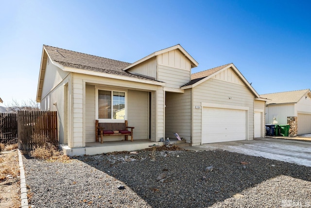 view of front of home featuring a garage and covered porch