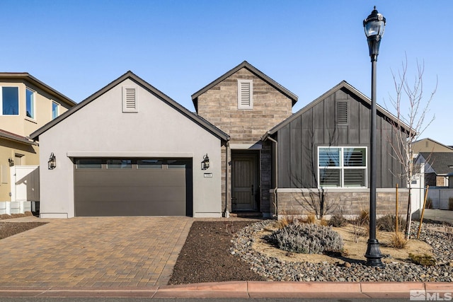 view of front of property with a garage