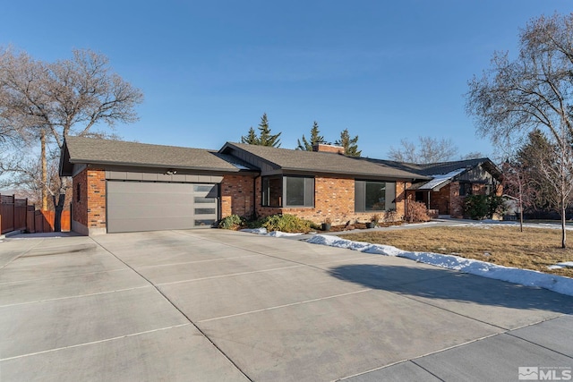 ranch-style home with a garage