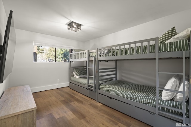 bedroom featuring dark hardwood / wood-style floors