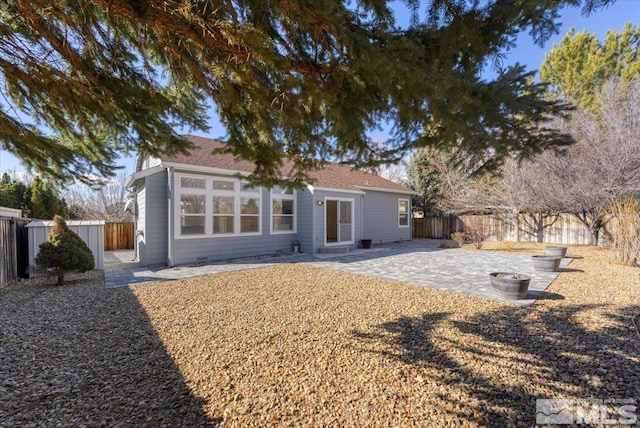 back of house featuring a patio