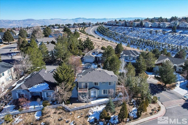 birds eye view of property featuring a mountain view