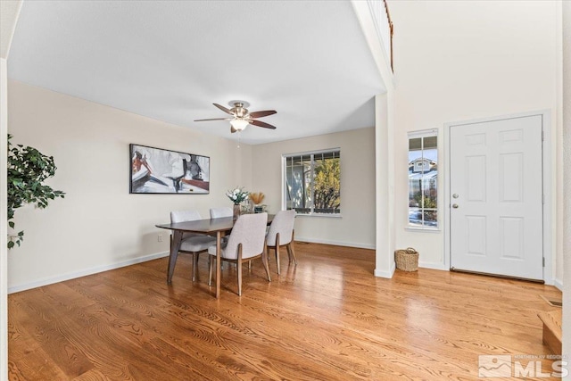 dining space featuring ceiling fan and light hardwood / wood-style floors