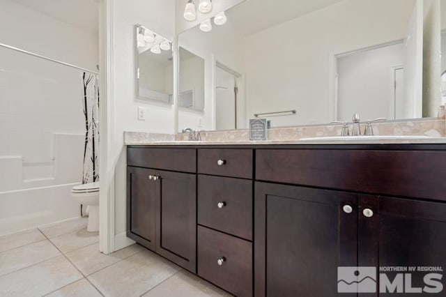 full bathroom with toilet, vanity, shower / bathtub combination with curtain, and tile patterned flooring