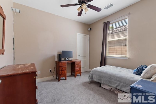 carpeted bedroom featuring ceiling fan