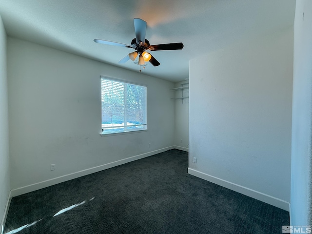 carpeted empty room with ceiling fan