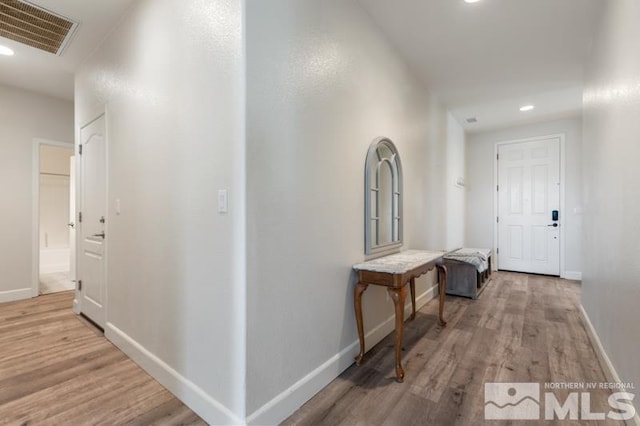 hallway featuring light wood-type flooring