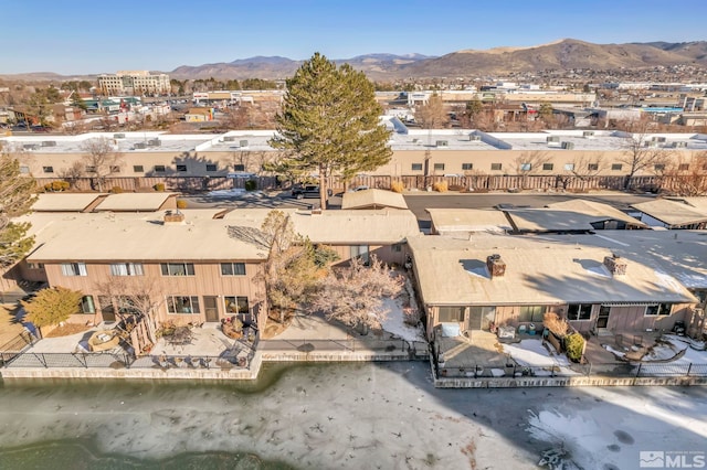 drone / aerial view featuring a mountain view