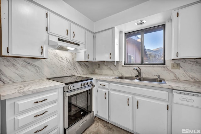 kitchen featuring sink, white cabinetry, stainless steel range with electric stovetop, dishwasher, and decorative backsplash