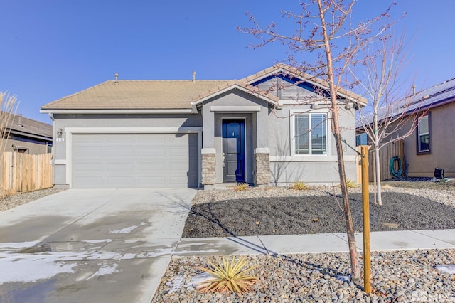 view of front of property featuring a garage