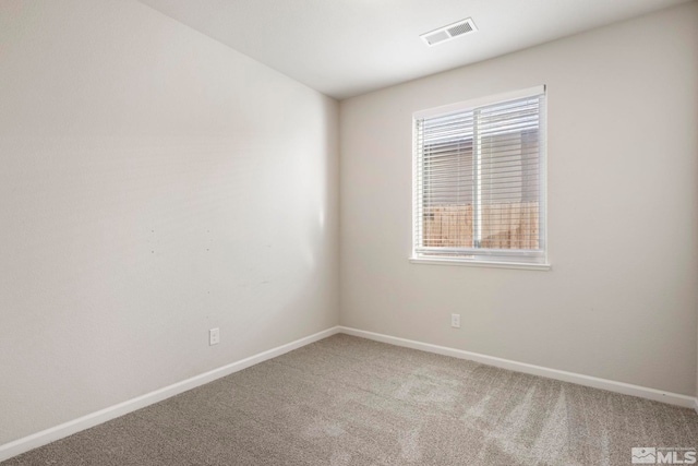 view of carpeted spare room