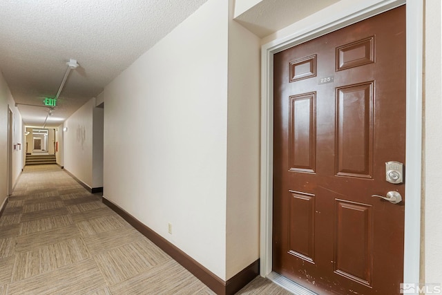 interior space featuring a textured ceiling