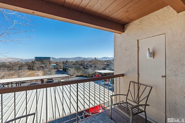 balcony featuring a mountain view