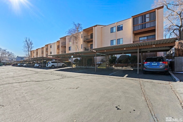 exterior space featuring a carport