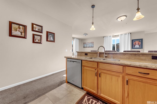 kitchen with sink, dishwasher, hanging light fixtures, light carpet, and light brown cabinets