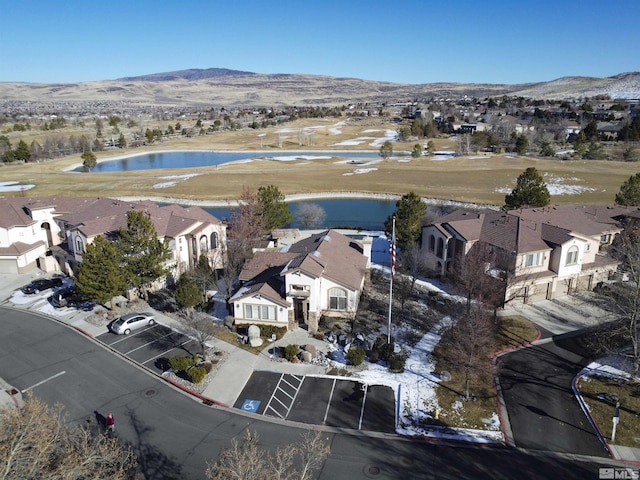 aerial view with a water and mountain view