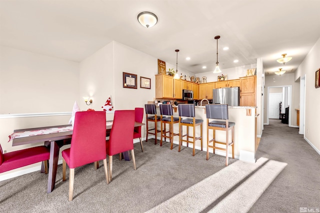 view of carpeted dining room