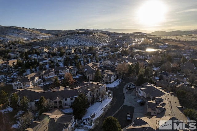 aerial view at dusk with a mountain view