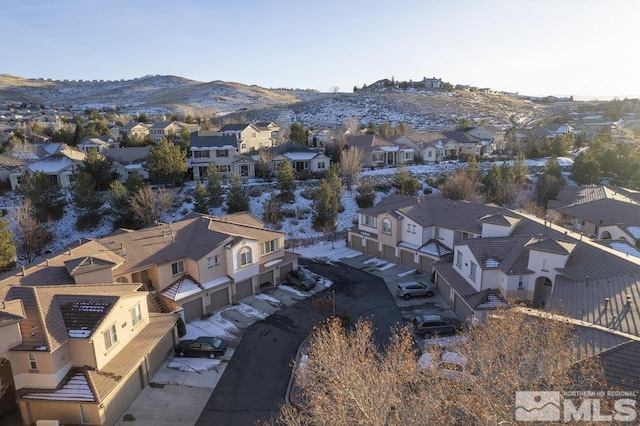 birds eye view of property featuring a residential view and a mountain view