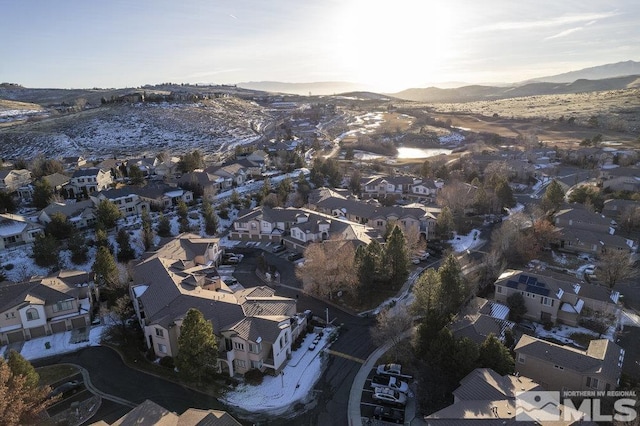 drone / aerial view featuring a mountain view