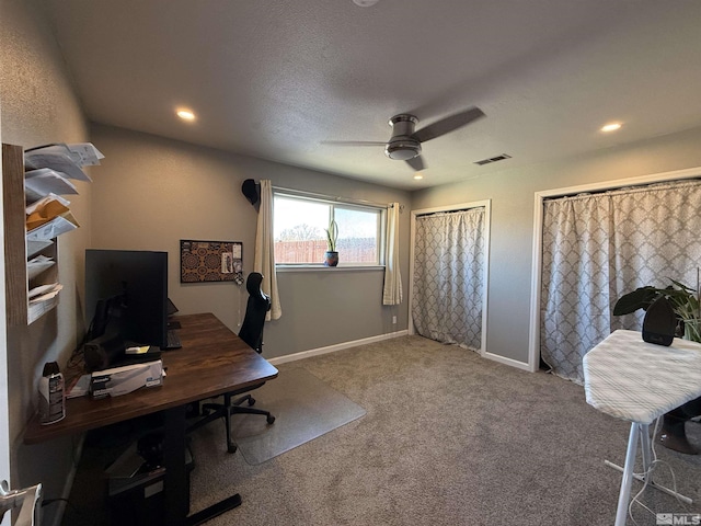 home office featuring carpet and ceiling fan