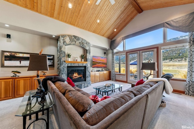 living room with high vaulted ceiling, a fireplace, wooden ceiling, light colored carpet, and beamed ceiling