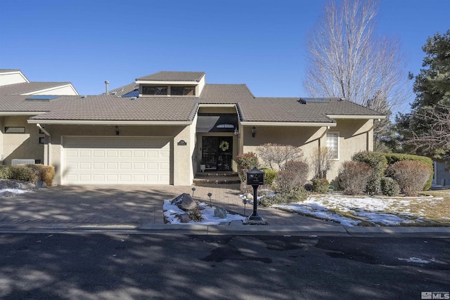 view of front of home featuring a garage