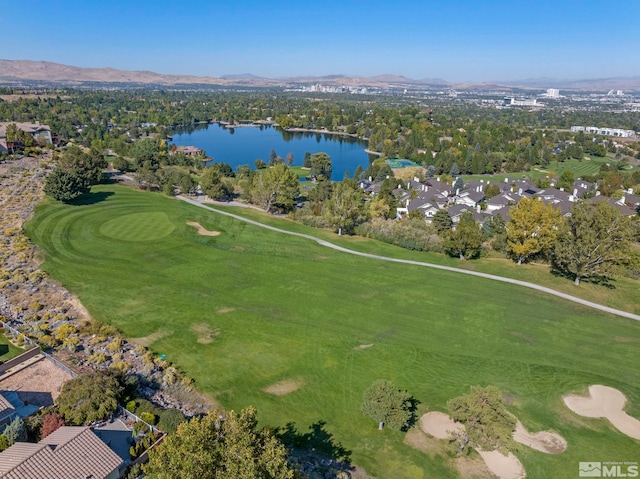 birds eye view of property featuring a water and mountain view