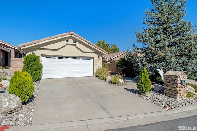 ranch-style home with a garage