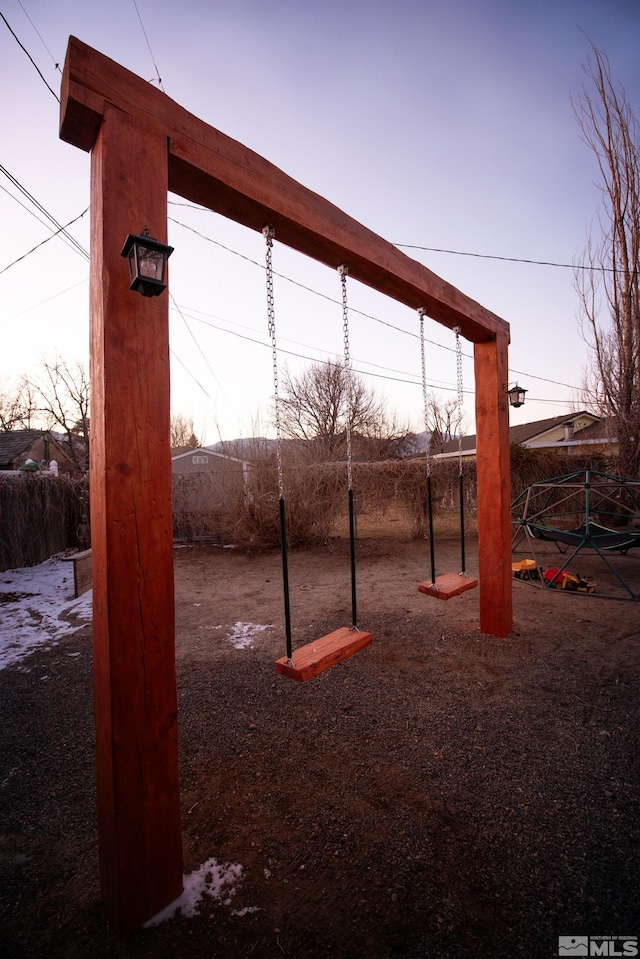 view of playground at dusk