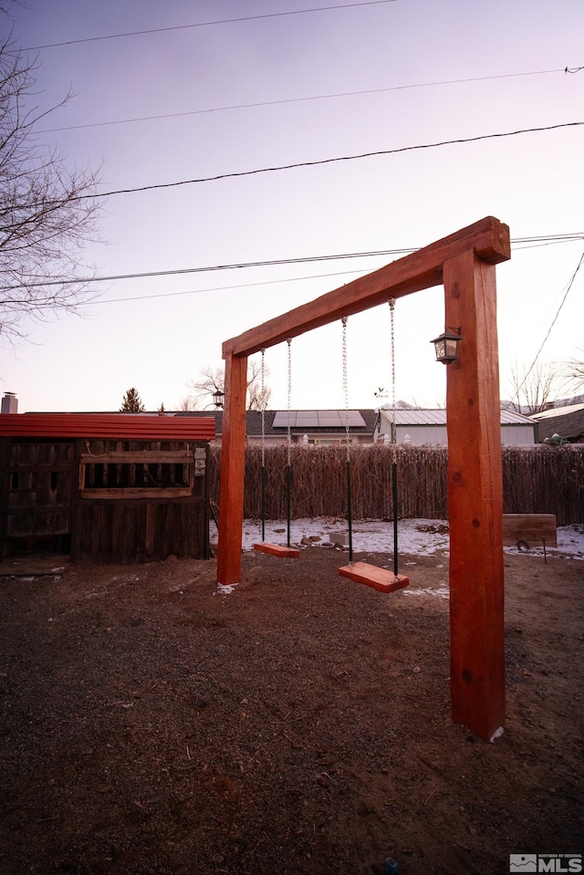 view of playground at dusk