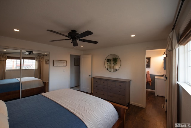 bedroom featuring ceiling fan and dark hardwood / wood-style flooring