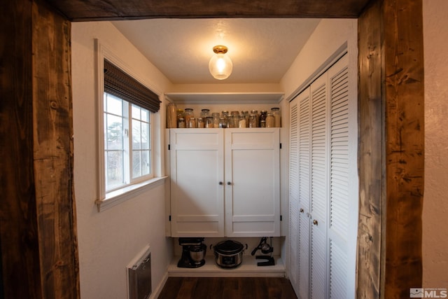 interior space with dark hardwood / wood-style floors