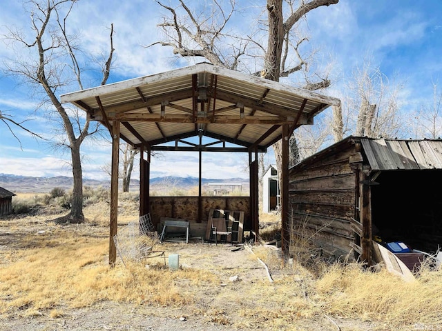 view of outdoor structure with a mountain view