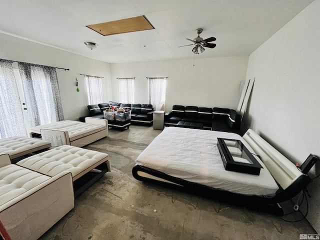 bedroom with concrete floors and ceiling fan