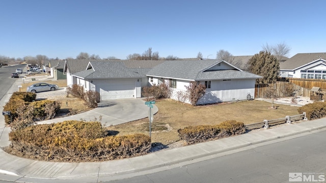 single story home featuring a garage