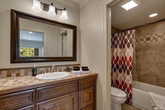 full bathroom with tile patterned flooring, ornamental molding, vanity, shower / tub combo, and toilet