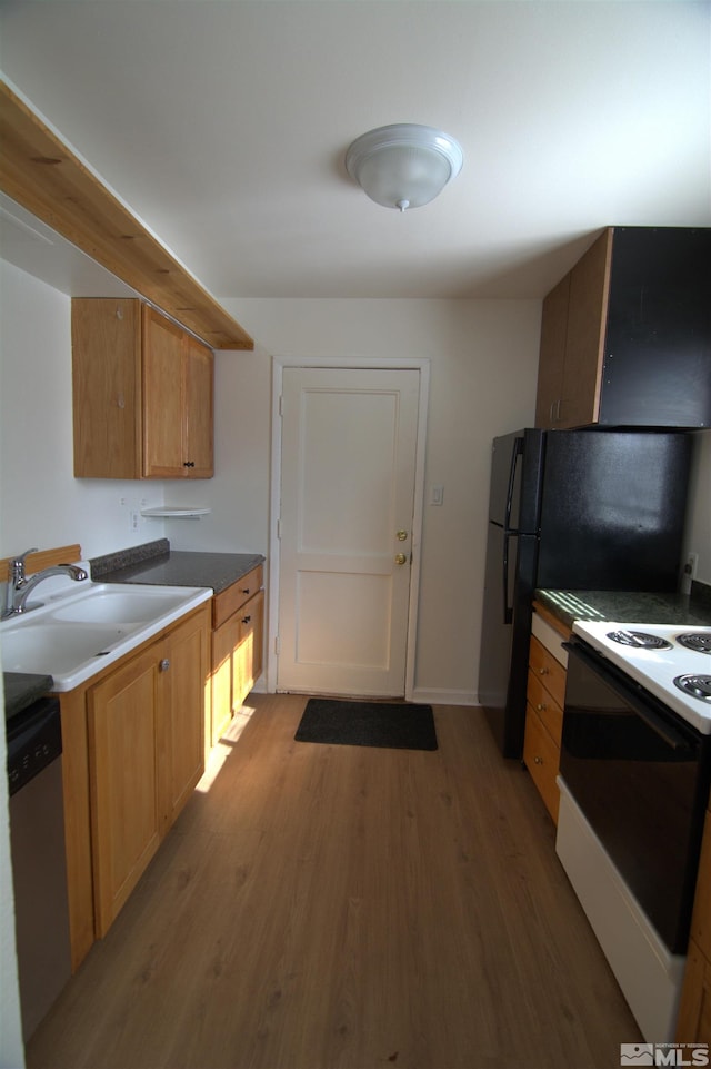 kitchen with dark hardwood / wood-style floors, stainless steel dishwasher, white electric range oven, and sink