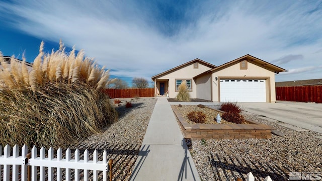 ranch-style house featuring a garage