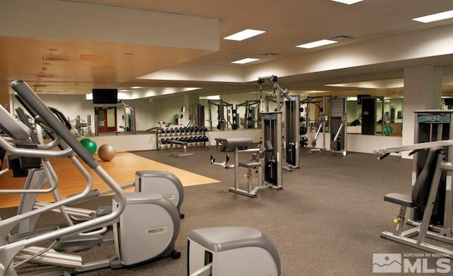 gym with a drop ceiling