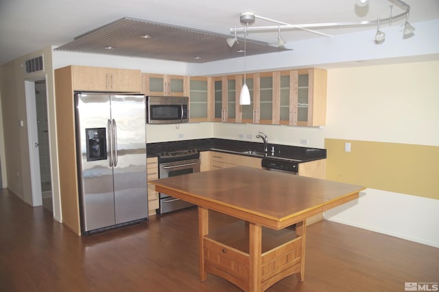 kitchen featuring light brown cabinetry, sink, stainless steel appliances, and dark hardwood / wood-style floors