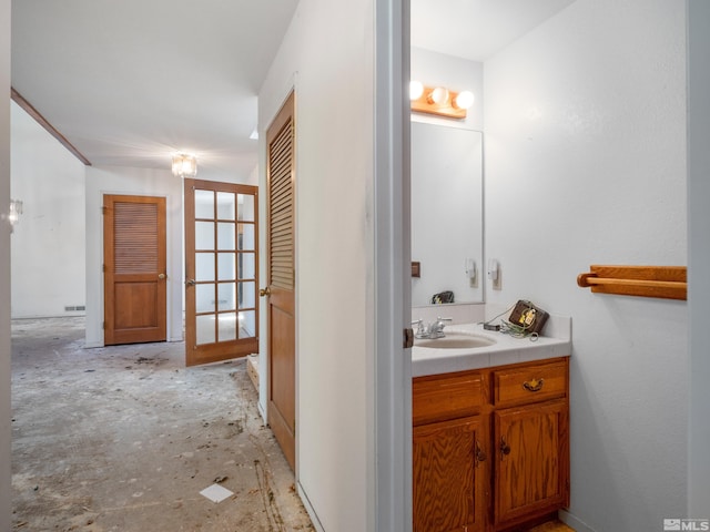 bathroom featuring vanity and french doors