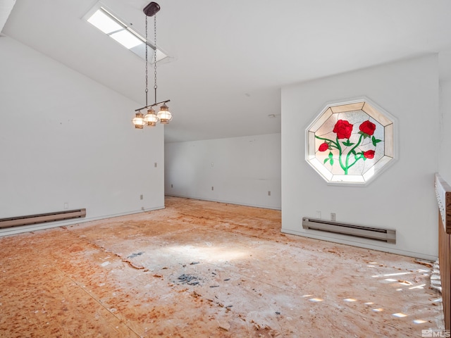 interior space featuring a baseboard radiator and vaulted ceiling