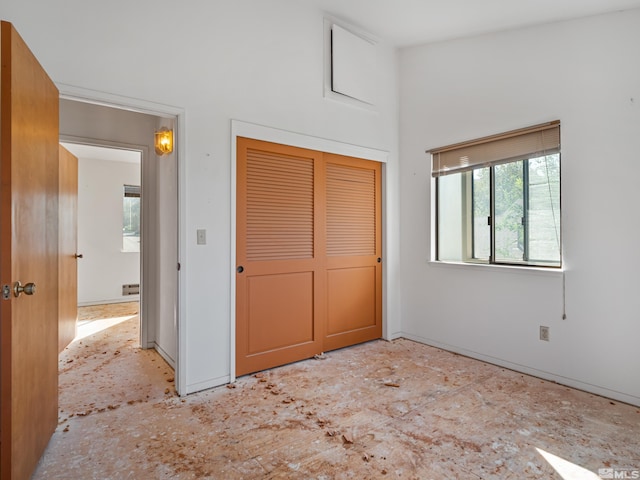 unfurnished bedroom with a closet