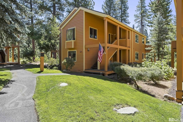 exterior space with a front lawn