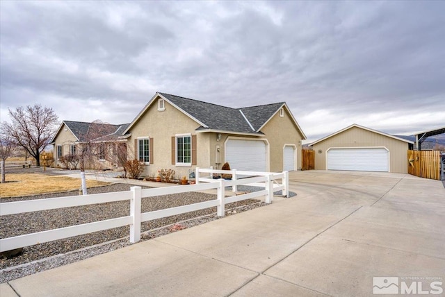 single story home featuring a garage