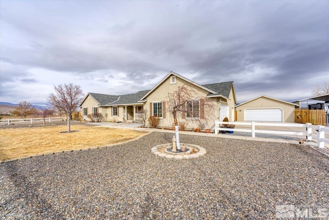 ranch-style house featuring a garage